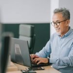 getty person happy at laptop 3 Explosive Crypto Trends that Might Catapult You to Wealth